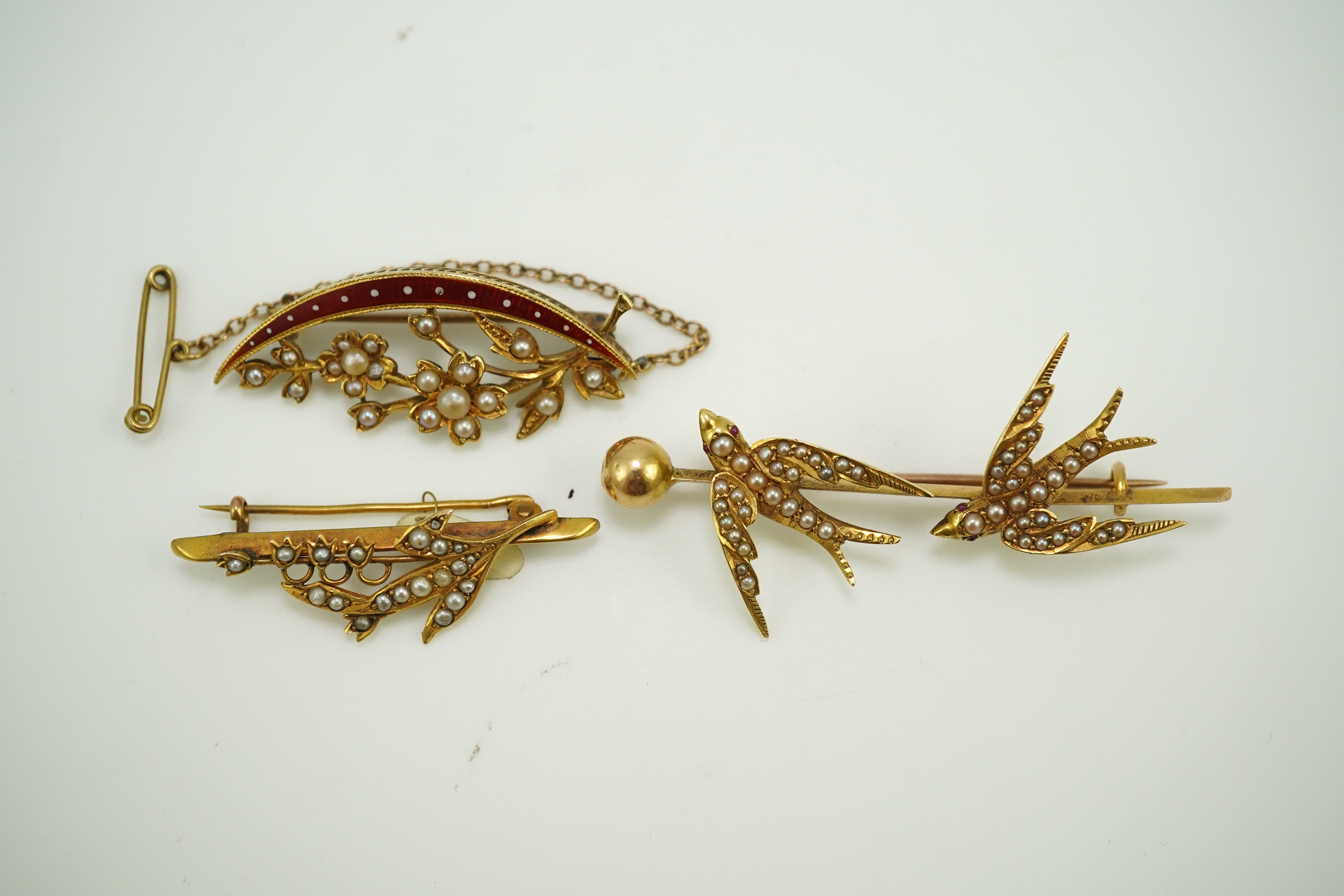 A collection of three late Victorian/Edwardian seed pearl brooches, circa 1900